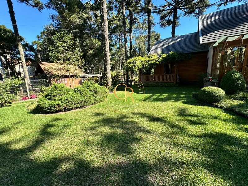 Charmosa casa com 4 dormitórios: 2ª foto da galeria de imagens do imóvel
