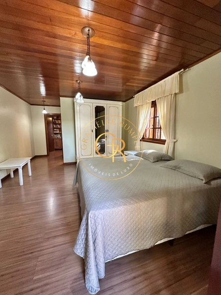 Charmosa casa com 4 dormitórios: 26ª foto da galeria de imagens do imóvel