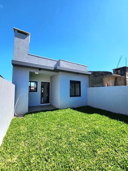 CASA 2 DORMITÓRIOS COM SUÍTE EM CAPÃO NOVO: 2ª foto da galeria de imagens do imóvel