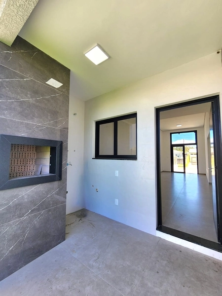 CASA 2 DORMITÓRIOS COM SUÍTE EM CAPÃO NOVO: 3ª foto da galeria de imagens do imóvel