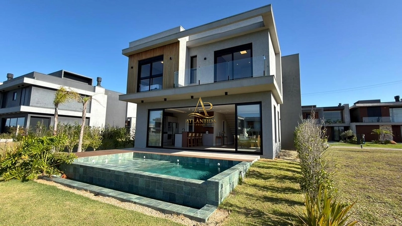 Magnífico sobrado com 5 suítes, piscina, living integrado e mais de 234 m², totalmente mobiliado e decorado.: 4ª foto da galeria de imagens do imóvel