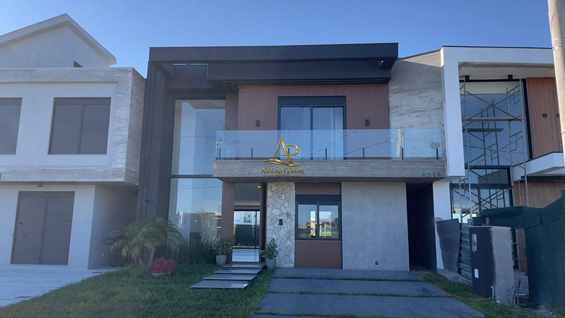 Residência exclusiva em condomínio fechado no bairro Maristela, em Xangri-Lá.: 4ª foto da galeria de imagens do imóvel