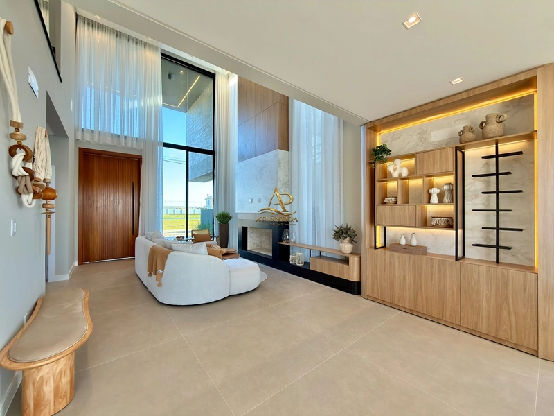 Um sobrado de alto padrão, mobiliado e decorado, com 04 suítes, piscina privativa, deck, jardim e living integrado, em um dos condomínios mais desejados de Xangri-Lá.: 8ª foto da galeria de imagens do imóvel