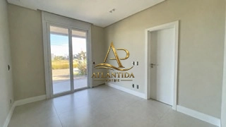 Elegância, espaço e exclusividade definem esta magnífica residência! localizada em condomínio fechado no bairro Maristela, em Xangri-Lá.: 10ª foto da galeria de imagens do imóvel