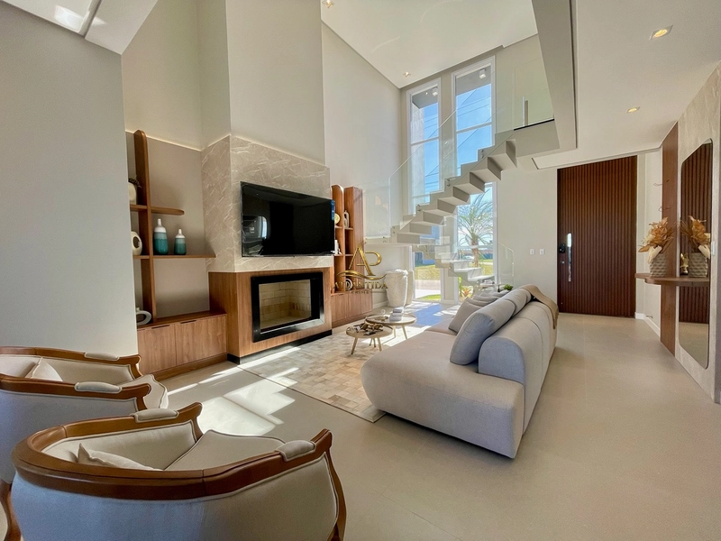 Uma casa completa, sofisticada e pronta para morar! Ambientes integrados, cozinha com ilha e churrasqueira, amplo terreno de 250 m² e vaga para 2 carros.: 5ª foto da galeria de imagens do imóvel