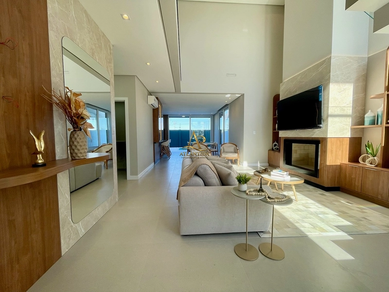 Uma casa completa, sofisticada e pronta para morar! Ambientes integrados, cozinha com ilha e churrasqueira, amplo terreno de 250 m² e vaga para 2 carros.: 6ª foto da galeria de imagens do imóvel