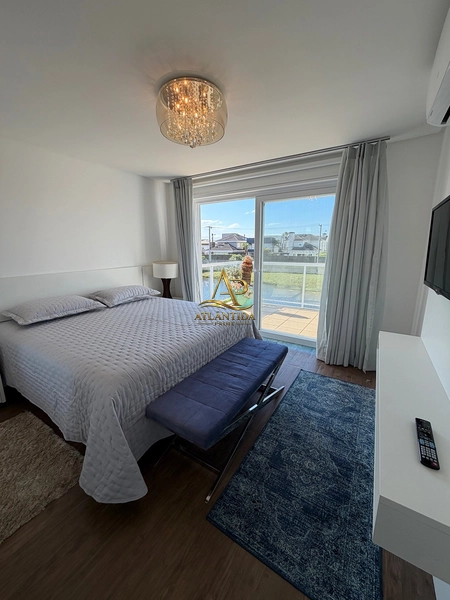 Uma residência que reúne conforto, praticidade e lazer, em uma localização privilegiada de Atlântida, na divisa com Capão da Canoa.: 22ª foto da galeria de imagens do imóvel