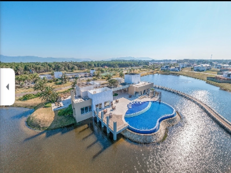 LOTE À VENDA EM CONDOMÍNIO FECHADO - IDEAL PARA CONSTRUIR SEU LAR DOS SONHOS: 1ª foto da galeria de imagens do imóvel