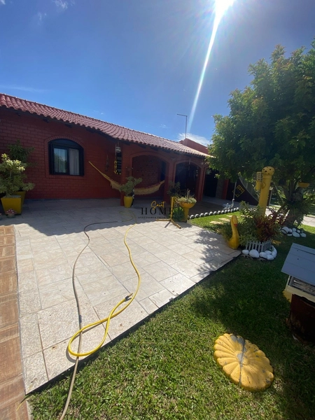 Casa em Imbé próxima ao mar: 13ª foto da galeria de imagens do imóvel