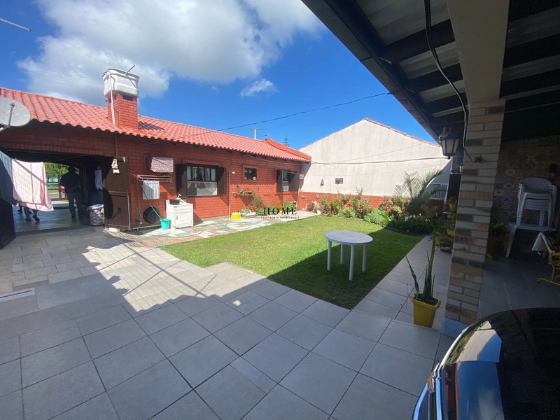 Casa em Imbé próxima ao mar: 2ª foto da galeria de imagens do imóvel