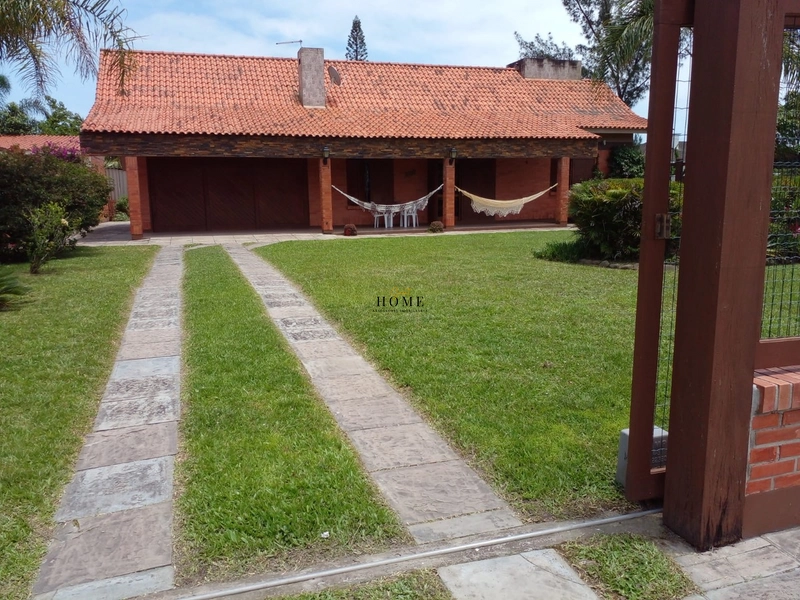 Casa à venda com 2 terrenos em Xangri-lá: 2ª foto da galeria de imagens do imóvel