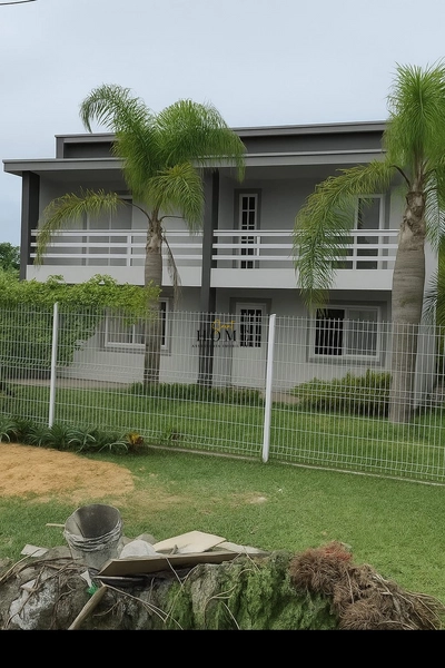 Sobrado à venda no centro de Imbé próximo ao mar: 1ª foto da galeria de imagens do imóvel