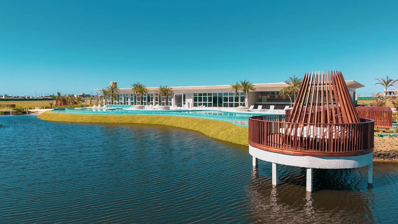 Lote beira lago no Condomínio Wave Home Resort: 3ª foto da galeria de imagens do imóvel