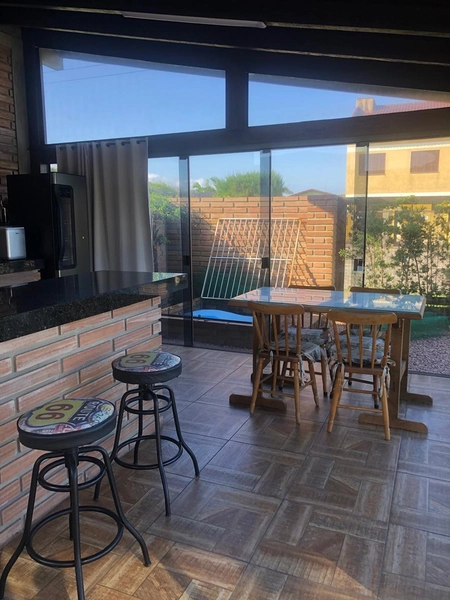 🏡 Casa com terreno amplo à venda no Litoral Norte/RS: 2ª foto da galeria de imagens do imóvel