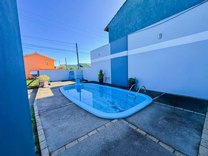 Casa de esquina com piscina no centro de Imbé: 4ª foto da galeria de imagens do imóvel