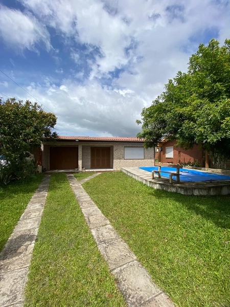 🏡 CASA COM PISCINA À VENDA EM MARILUZ – IMBÉ/RS! 🌊☀️: 1ª foto da galeria de imagens do imóvel