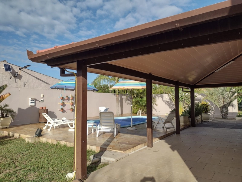 Casa em Mariluz com 2 terrenos: 2ª foto da galeria de imagens do imóvel