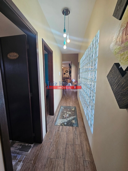 Com 2 terrenos e piscina: 35ª foto da galeria de imagens do imóvel