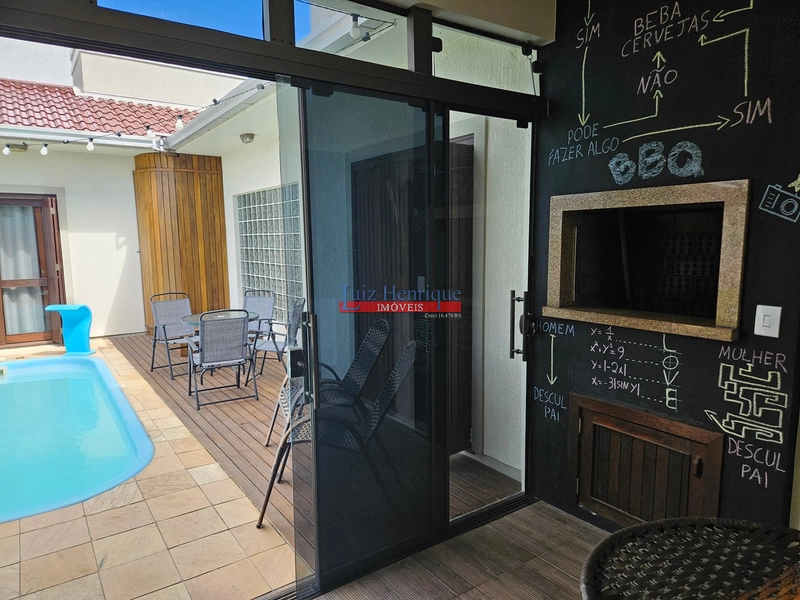 Com 2 terrenos e piscina: 45ª foto da galeria de imagens do imóvel