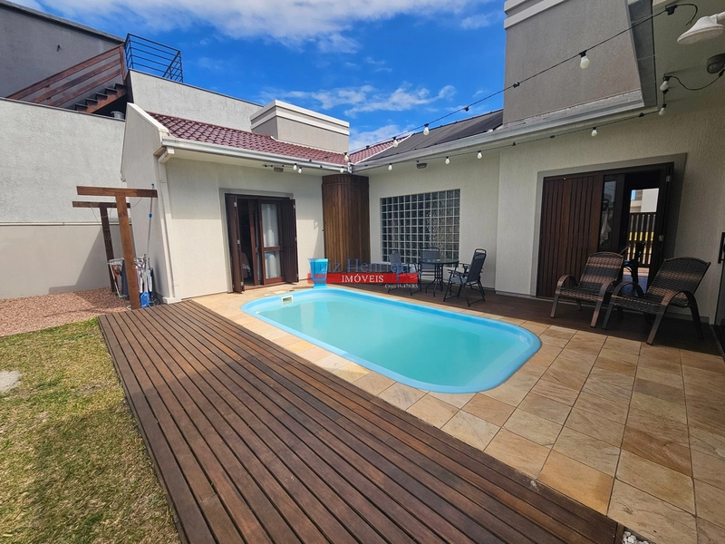 Com 2 terrenos e piscina: 48ª foto da galeria de imagens do imóvel