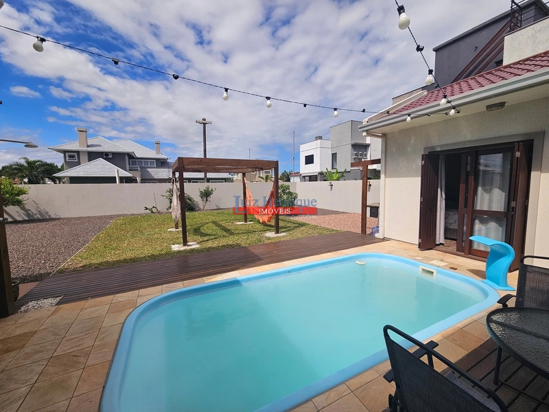 Com 2 terrenos e piscina: 46ª foto da galeria de imagens do imóvel