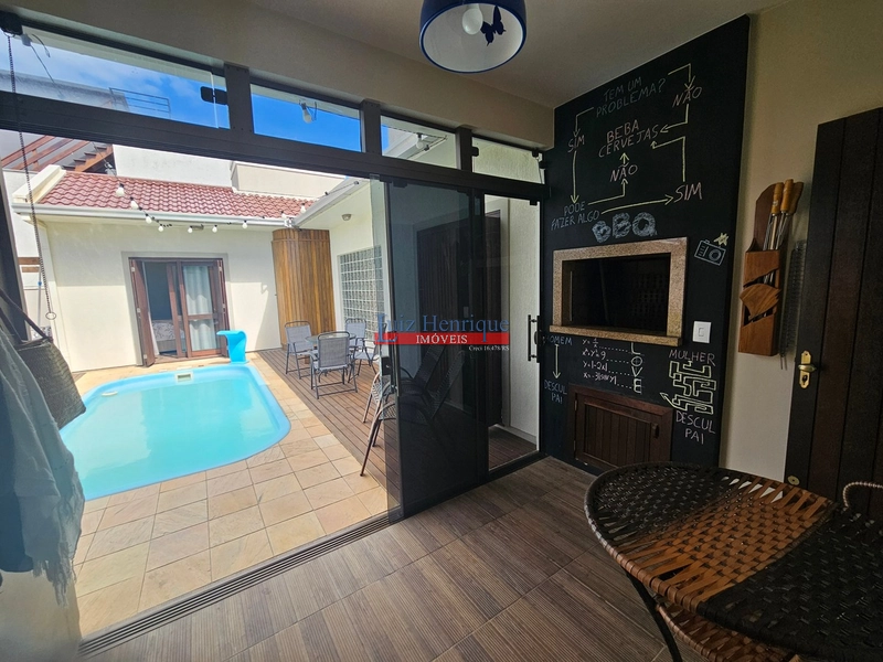 Com 2 terrenos e piscina: 44ª foto da galeria de imagens do imóvel