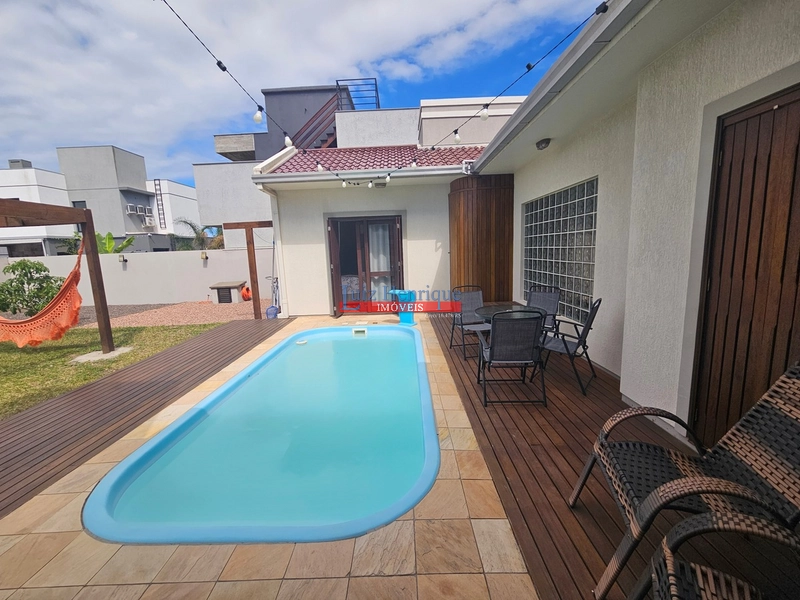 Com 2 terrenos e piscina: 47ª foto da galeria de imagens do imóvel