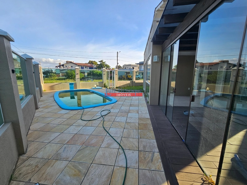 Maravilhosa casa no Capão Novo Village: 4ª foto da galeria de imagens do imóvel