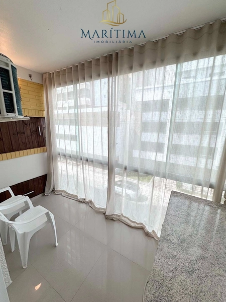 Apartamento com sacada em Tramandaí!: 3ª foto da galeria de imagens do imóvel
