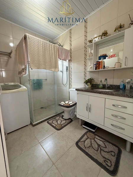 Casa a venda no Centro de Tramandaí, próxima ao mar: 1ª foto da galeria de imagens do imóvel