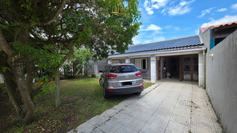 Casa com 03 dormitórios a poucos metros do Mar!: 1ª foto da galeria de imagens do imóvel
