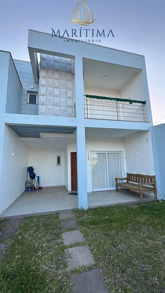 Sobrado com 03 dormitórios, próximo ao centrinho de Nova Tramandaí!!: 1ª foto da galeria de imagens do imóvel