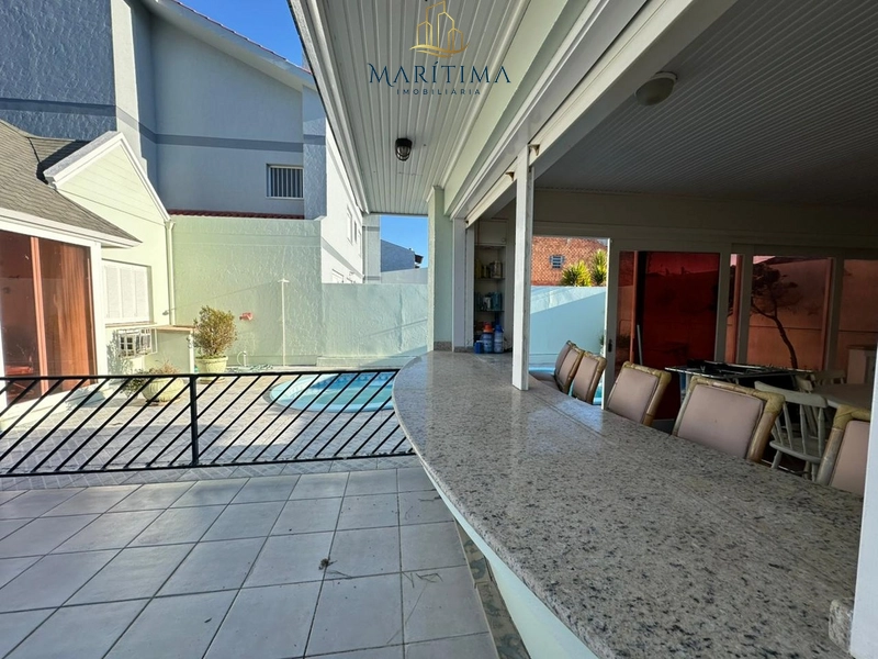 Casa estilo americana junto ao mar em Tramandaí: 15ª foto da galeria de imagens do imóvel