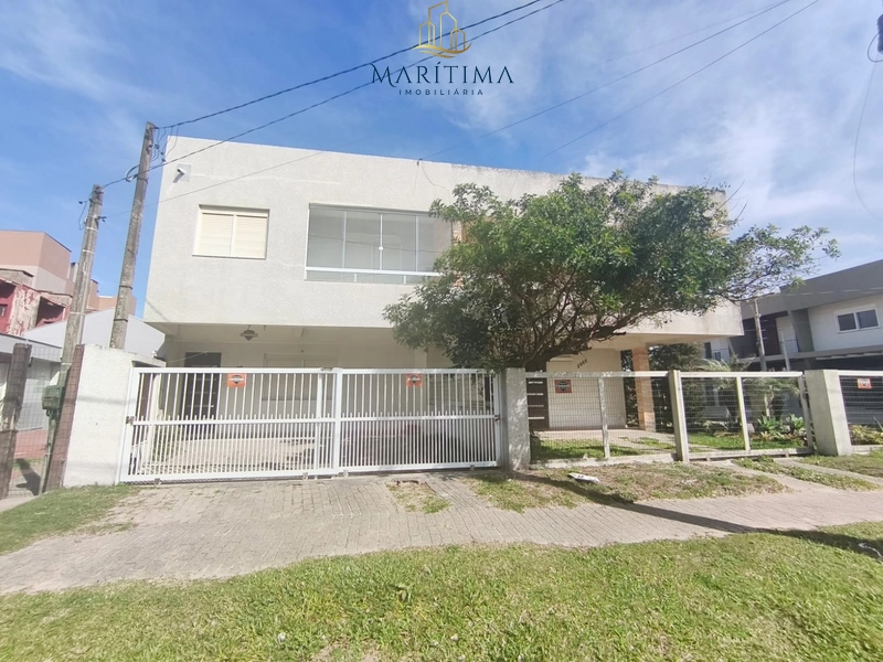 Sobrado 3 dormitórios com suite, pé na areia: 1ª foto da galeria de imagens do imóvel