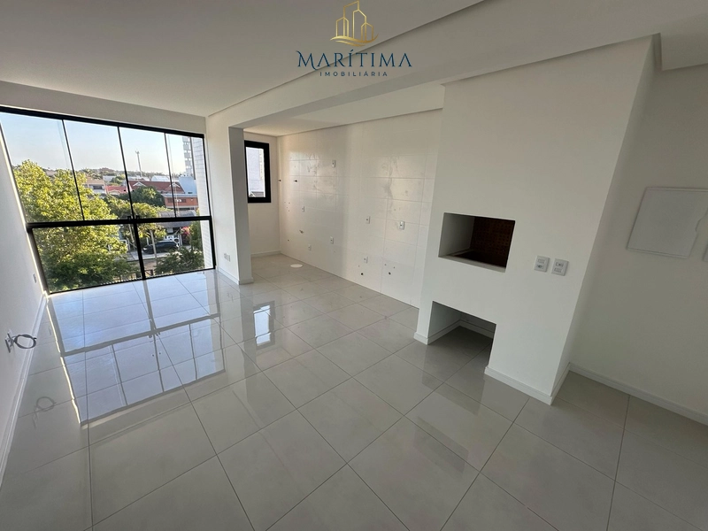 Apartamento com 2 dormitórios (1 suíte) no centro de Tramandaí: 3ª foto da galeria de imagens do imóvel
