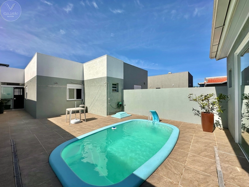 CASA COM PISCINA E ÁREA GOURMET À VENDA EM CAPÃO DA CANOA: 22ª foto da galeria de imagens do imóvel
