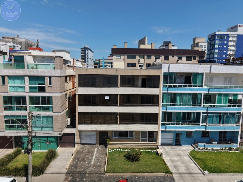 APARTAMENTO PÉ NA AREIA COM SACADA DE FRENTE: 2ª foto da galeria de imagens do imóvel