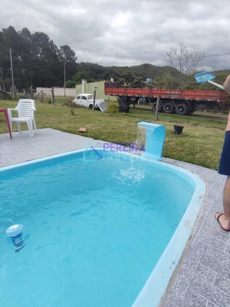 Chácara com piscina no bairro Santa Rica: 1ª foto da galeria de imagens do imóvel