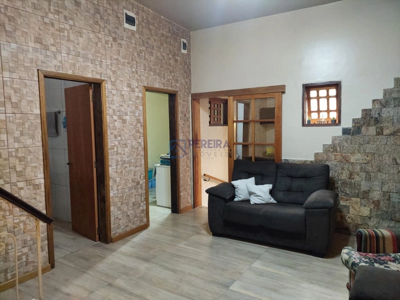 Casa com 03 dormitórios: 3ª foto da galeria de imagens do imóvel