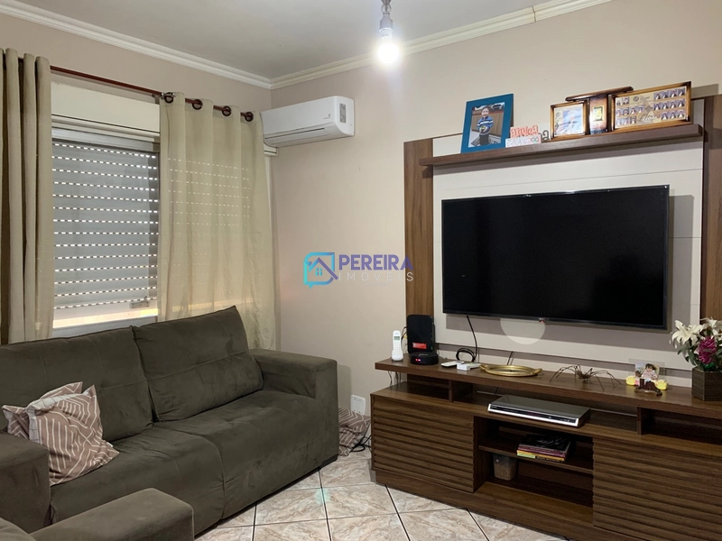 Apartamento com 2 dormitórios no Edifício Porto Belo.: 1ª foto da galeria de imagens do imóvel