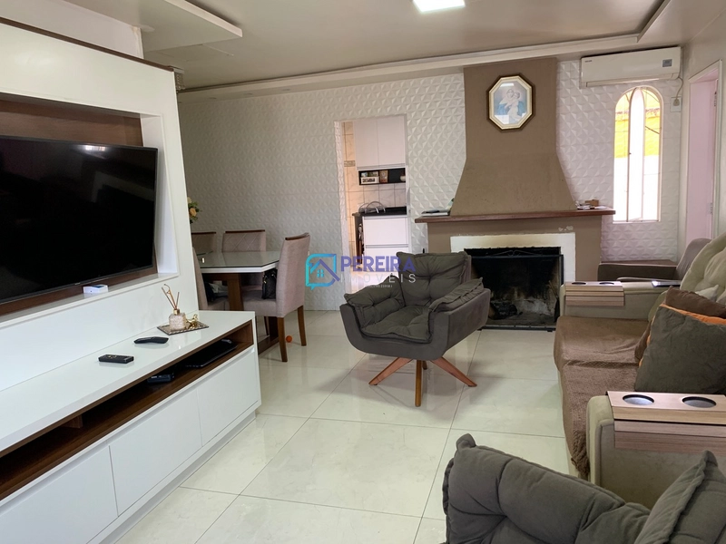 Casa de 03 dormitórios com sala comercial.: 40ª foto da galeria de imagens do imóvel