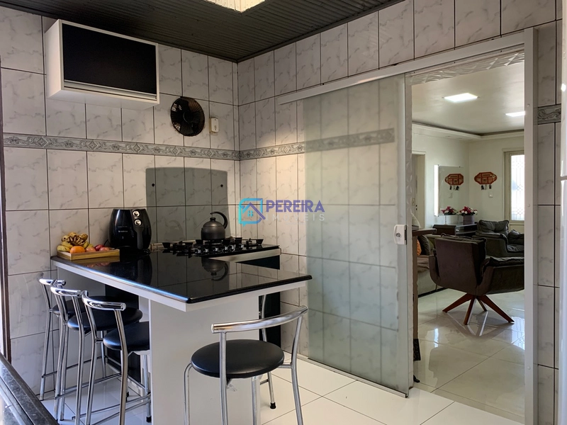 Casa de 03 dormitórios com sala comercial.: 20ª foto da galeria de imagens do imóvel
