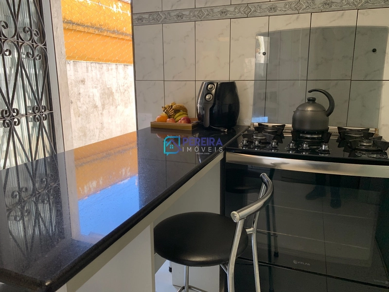 Casa de 03 dormitórios com sala comercial.: 24ª foto da galeria de imagens do imóvel