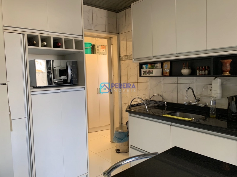 Casa de 03 dormitórios com sala comercial.: 23ª foto da galeria de imagens do imóvel