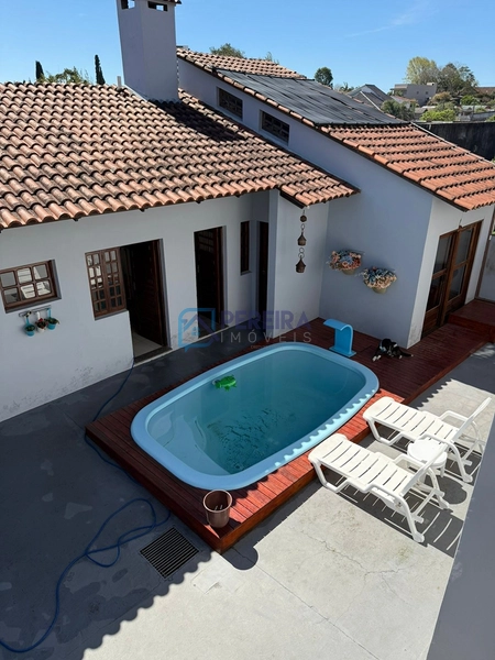 Casa 03 dormitórios com piscina: 41ª foto da galeria de imagens do imóvel