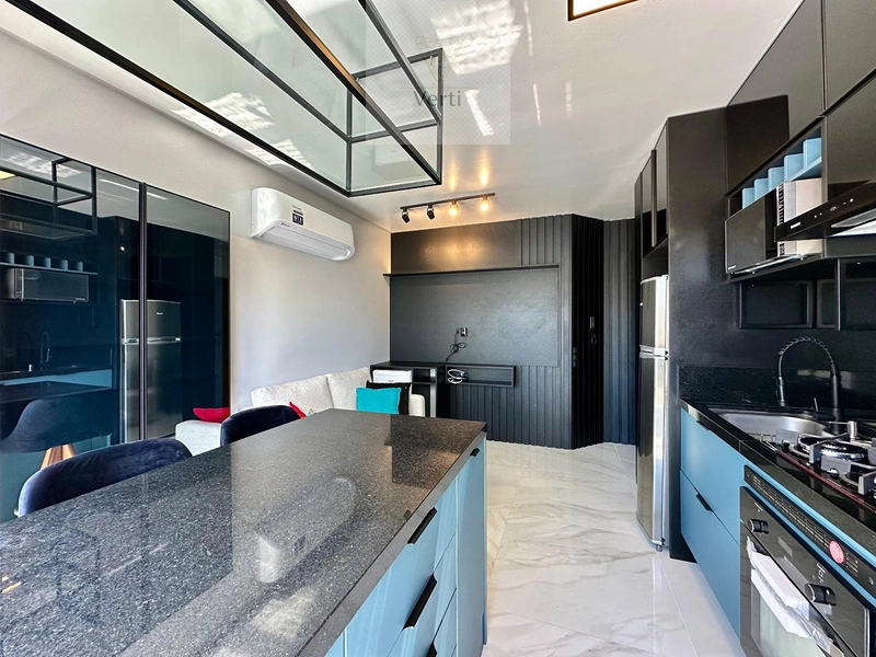 Um dormitório mobiliado e decorado! Prédio com roofotp: 4ª foto da galeria de imagens do imóvel