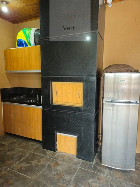 Casa 3 Dormitórios Capão Novo: 3ª foto da galeria de imagens do imóvel