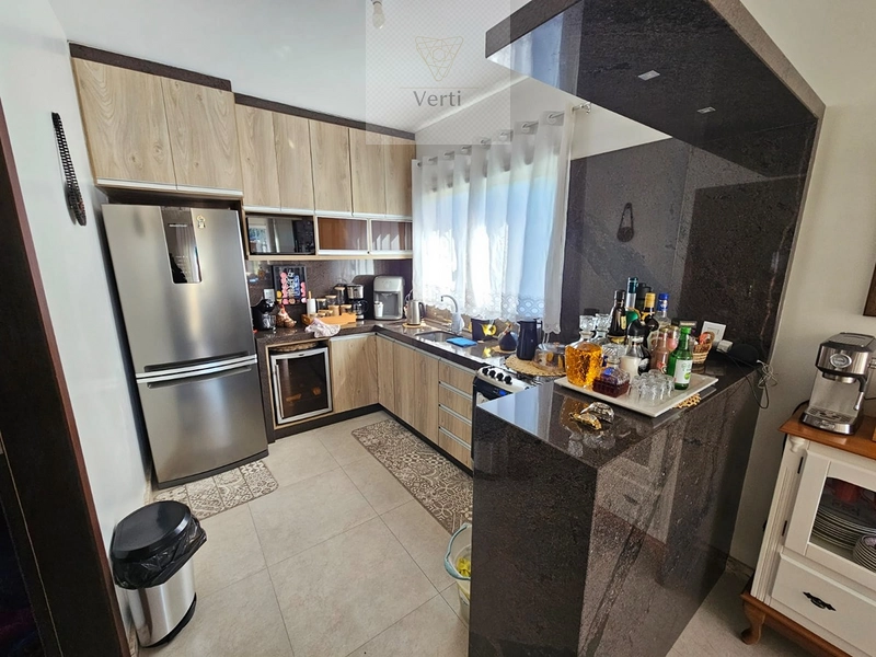 Casa 3 Dormitórios Capão Novo: 11ª foto da galeria de imagens do imóvel