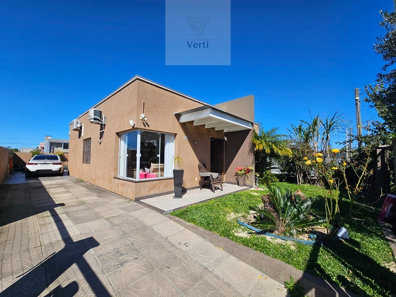 Casa 3 Dormitórios Capão Novo: 1ª foto da galeria de imagens do imóvel