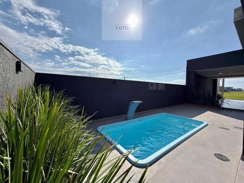 SOBRADO MODERNO COM PISCINA E AUTOMAÇÃO NO NOVA XANGRI-LÁ: 3ª foto da galeria de imagens do imóvel